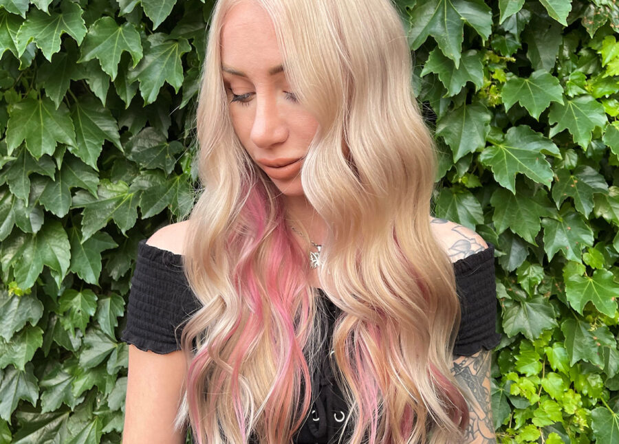 Female Model in Platinum Blonding with wisps of Strawberry Hair Color By Kayla Boyer